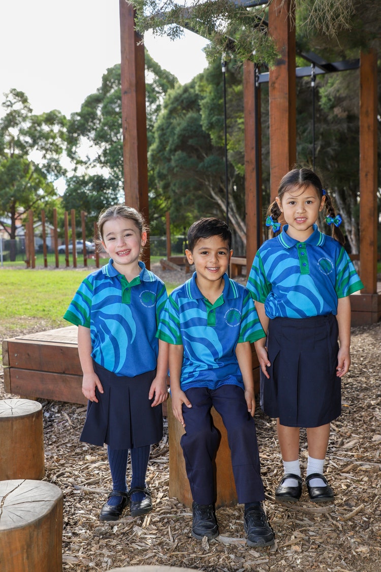 Three students standing together